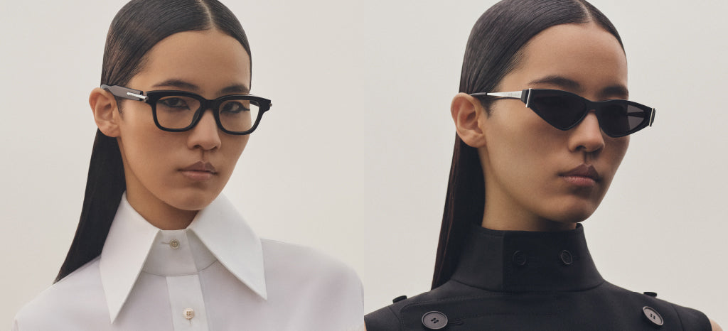 A woman with straight dark hair poses in two outfits: on the left, she wears black-rimmed glasses and a white shirt with an extra-wide collar; on the right, she wears angular sunglasses and a high-collared black coat.