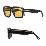 Tom Ford Sunglasses FT1202/S 01E 56 feature a black square frame with yellow-tinted lenses, thin metallic temple lines, and subtle yellow accents—shown from front and side angles, ideal for Miami flair.