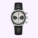 The Hamilton American Classic Intra-Matic Auto Chrono 40 mm H38416711 features a silver panda dial with black subdials, a black tachymeter bezel, and black leather strap. Powered by the H-31 automatic movement; displayed on a light background.