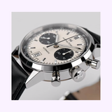 Close-up of the Hamilton Watches American Classic Intra-Matic Auto Chrono 40 mm (H38416711), a panda dial timepiece with a cream dial, two black subdials, date window, leather strap, polished details, pushers, and H-31 automatic movement.