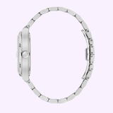 A Bulova Watches 96B440 Super Seville men's luxury watch with a round case and partially open link bracelet, shown in side profile against a light lavender background. Brand: Bulova Watches. UPC: 042429599789.