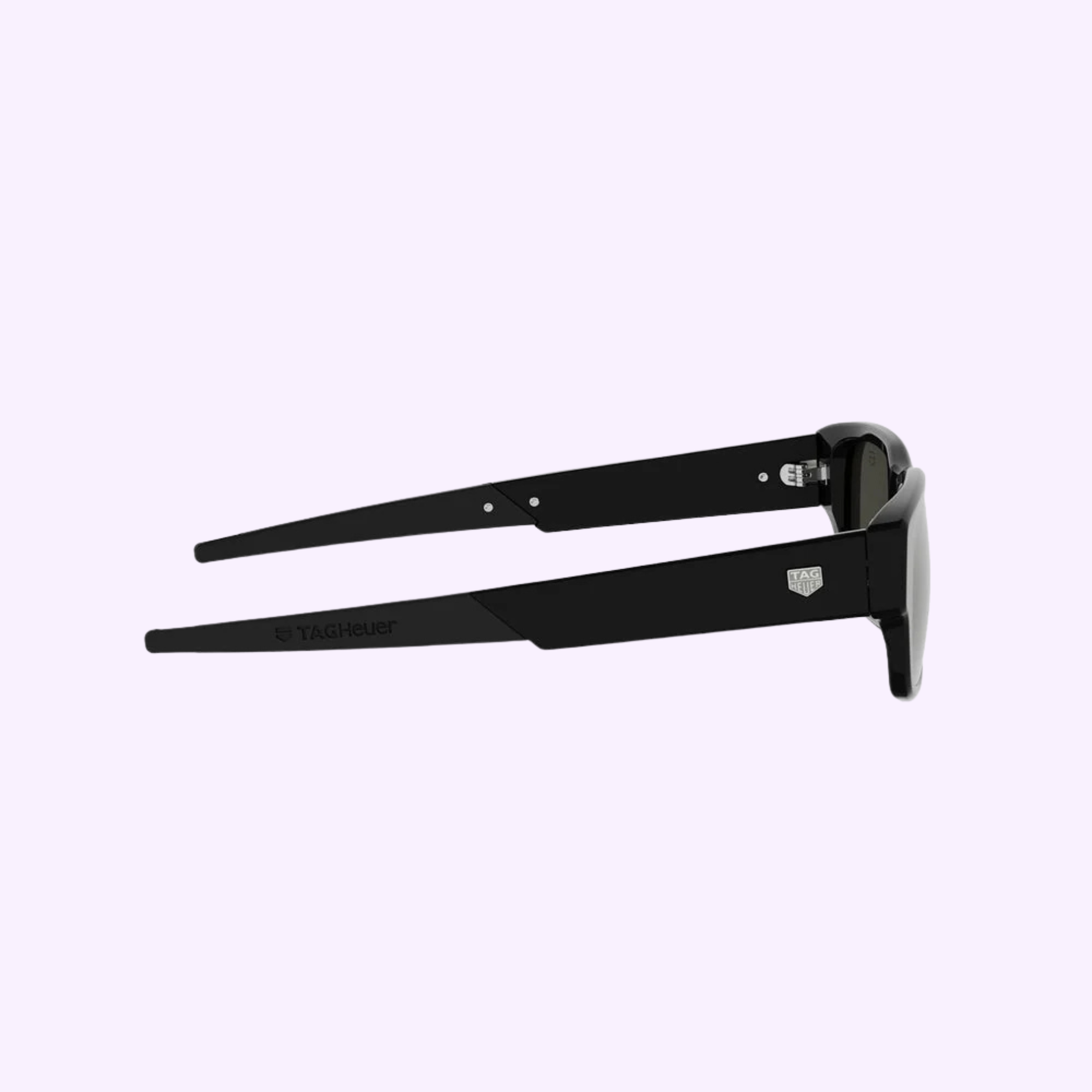 Side view of 100% authentic Tag Heuer Optical sunglasses (TH40061I 5401A) with dark lenses and logo on the temple, set against a light purple background. Available from a Miami Authorized Dealer.