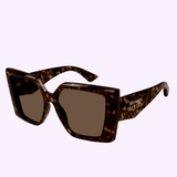 These bold square sunglasses from Alexander McQueen (AM0467S-002) feature a brown tortoiseshell design with thick frames and dark lenses, finished with the signature Alexander McQueen logo in white on the temple for a luxurious touch.