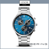 The Bering 11743707 Titan Chrono Men’s Watch features a blue face, three subdials, date display, and silver markers in a minimalist Danish design. Displayed on white with Lexor Miami and Bering Watches logos.