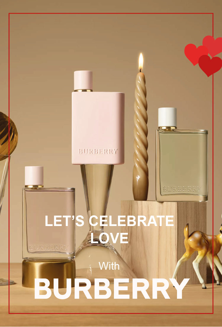 Burberry perfume bottles displayed on a wooden surface with a lit candle, gold deer figurine, and red heart graphics. Text reads: LETS CELEBRATE LOVE With BURBERRY.