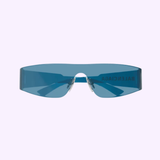 Experience cutting-edge designer eyewear with the Balenciaga BB0041S-014 99 Sunglasses. These avant-garde, blue-tinted visor sunglasses feature a single seamless lens, metal nose pads, and the signature BALENCIAGA branding subtly displayed on the right lens—offering authenticity and distinction from Balenciaga Sunglasses.