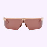 Front view of the Balmain MAJOR BPS-147C-142 Unisex Sunglasses by Balmain Sunglasses, featuring a single wide reddish-brown lens and a light pink translucent frame, displayed on a pale background.