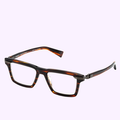 Rectangular tortoiseshell eyeglasses with thick frames and metal hinge detailing, set against a light purple background—Balmain Optical Frame BPS BPX-141B Legion IV for a refined look.