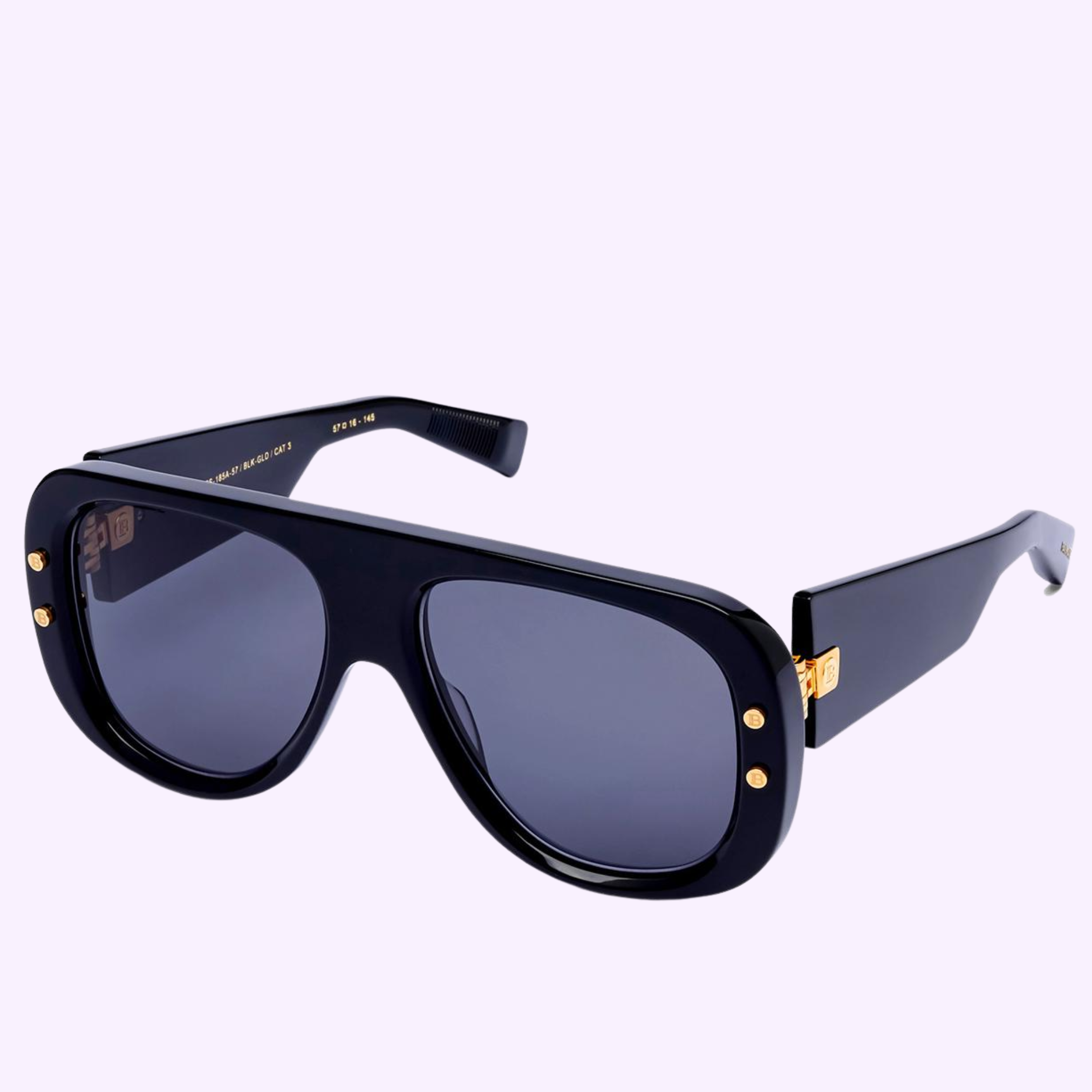 Balmain Sunglasses PULSE BPS-185A-57 Unisex: black oversized designer sunglasses with dark lenses, gold hinge accents, and thick arms, shown on a light purple background.