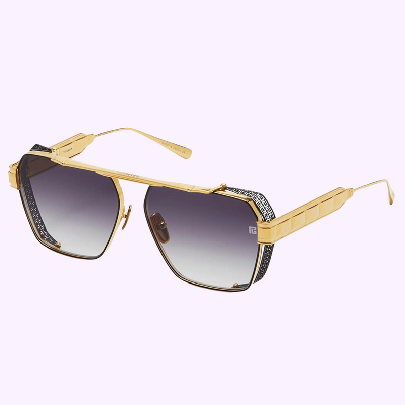 Balmain Premier BPS-155A-61 sunglasses, full front view with gold titanium frame and gradient grey lenses