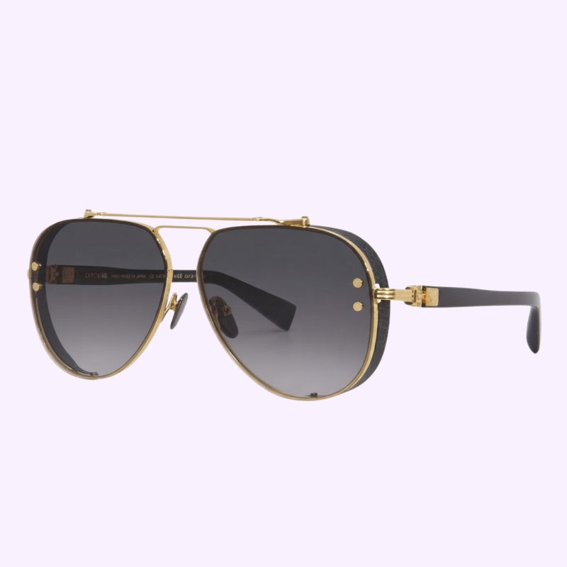 Luxury Balmain BPS-125A-62 Captaine designer sunglasses featuring a gold aviator frame and gray gradient lenses for men and women
