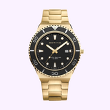 The Bering Watches Classic 18940-732 Men showcases a gold case and band, black dial, gold hour markers, Bering branding, date window, and "Arctic Sailing 10 ATM"—ideal for those seeking classic style from Bering Watches.