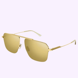 The Bottega Veneta BV1149S-002 58 Unisex Metal Sunglasses feature square, mirrored lenses and slim gold metal frames, elegantly displayed on a light purple background to highlight the refined luxury of Bottega Veneta eyewear.