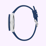 Side view of the Bulova Watches Bulova Watch HNBR Rubber Snorkel 98B474 Special Edition, featuring a white case and crown with a blue textured HNBR rubber strap and buckle, displayed against a light pastel background.