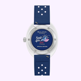 The back of the Bulova Watch HNBR Rubber Snorkel 98B474 Special Edition from Bulova Watches features a blue HNBR rubber strap and displays “Sail 4th,” an eagle, “1776-2026,” and “SPECIAL EDITION” in white engraved text. The background showcases blue patriotic graphics.