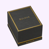 A sleek black square Bulova Watches box, featuring gold accents and the iconic Bulova logo prominently displayed on the top and side, is shown against a light backdrop—an ideal presentation case for your Bulova Watch Maquina 98A341.