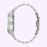 Side view of a silver-tone Bulova Watch Marc Anthony Surveyor 96A346 stainless steel watch, highlighting a link band and a crown featuring a logo.