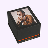Black gift box featuring a square portrait of a man wearing a Bulova Watch Marc Anthony Surveyor 96A346 on the lid.