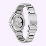 Exhibition case back of a Bulova Watch Marine Star 98b467, showing an exposed mechanical movement and a stainless steel link bracelet with a fold-over clasp.