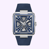 The Bulova Watches Series X Automatic 98A342, a square men’s skeleton watch with a blue dial, silver accents, and a blue leather strap, is shown on a light purple background.