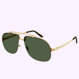 The Cartier CT0353S-002 62 men's metal sunglasses feature gold frames, dark green lenses, and tortoiseshell-patterned temple tips, shown on a light purple background.