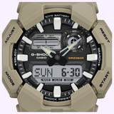 The tan CASIO G-Shock Watch Analog-Digital GA010-5A by G-Shock Watches displays the time 10:08:37 and date SUN 6-30 on its rugged, shock-resistant Carbon Core Guard case, features various function buttons and indicators, delivers enhanced durability, and offers a reliable 10-year battery life.