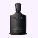 A matte black bottle of Creed Perfumes' Green Irish Tweed 3.4 EDP Men Perfume features embossed branding, silver text, a silver collar on the cap, and a sleek, elegant design.