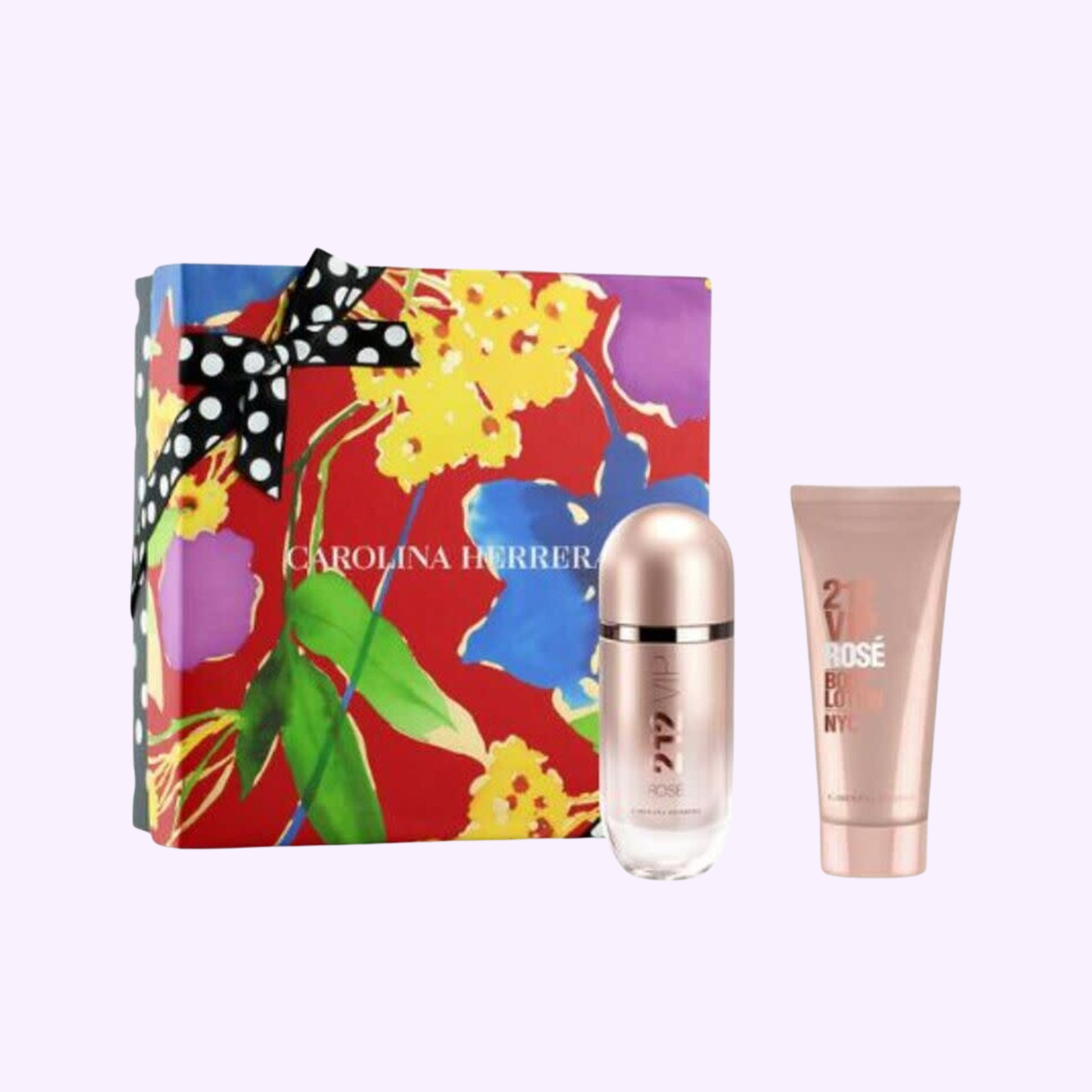 A vibrant Carolina Herrera 212 V.I.P Rose 2PC Set for Women by Carolina Herrera Perfumes comes in a floral box and includes a pink 212 V.I.P Rose perfume bottle and matching lotion, both labeled 212 Rosé.