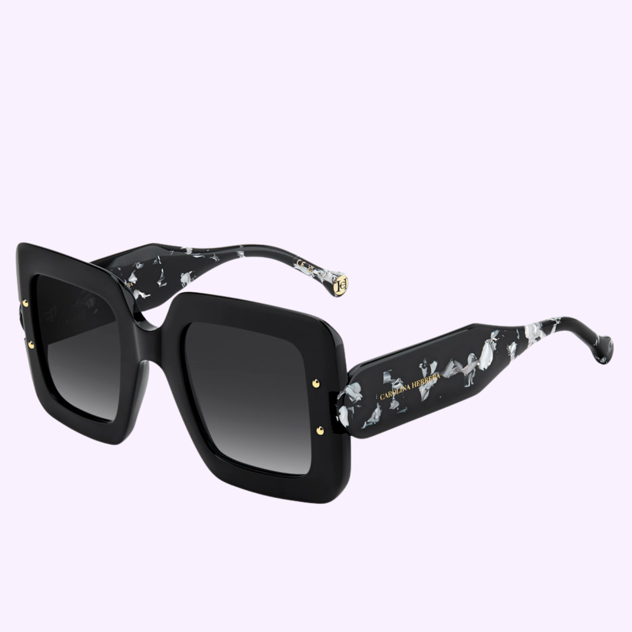 The Carolina Herrera Sunglasses HER 0322/S 807 BLACK feature thick black square frames, wide arms with a white floral pattern, gold accents, and gradient dark lenses—a striking piece from the Carolina Herrera Sunglasses line.