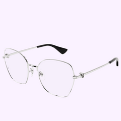The Cartier Optical Frame CT0413O-002 56 for women features a silver geometric metal design, clear lenses, and black temple tips. Shown on a light purple background, it’s an elegant choice from Cartier Optical (UPC: 843023169381).