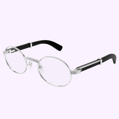The Cartier Optical Frame CT0464O-005 53 Men features round silver metal frames and black temple arms, displayed on a light purple background—ideal for those seeking men’s luxury eyewear with timeless style.