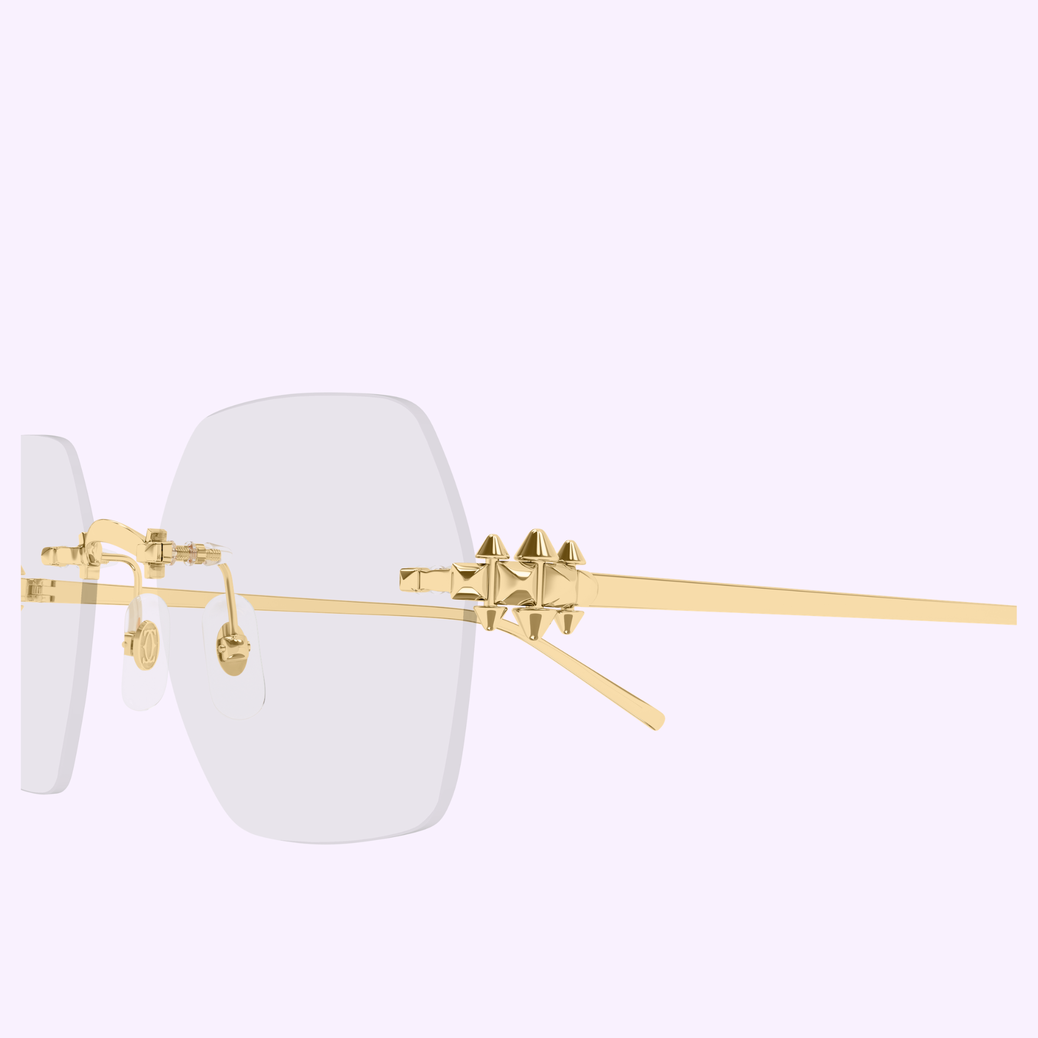 Close-up of Cartier Optical Frames CT0646O-001 54 Women by Cartier Sunglasses, featuring gold-toned arms and decorative gold spikes near the hinge, set against a light purple background—a luxurious women's eyewear choice.