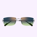 Experience luxury with Cartier Sunglasses CT0550S-008 56—rimless rectangular frames, gradient dark blue to green lenses, and elegant silver metal temples—set against a light pastel background.