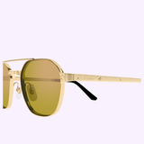 Featuring a thin gold metal frame with brown-tinted lenses, the Cartier Sunglasses CT0571S-004 52 by Cartier Sunglasses exemplify luxury eyewear. Distinctive screw accents and engraved text embellish the left temple arm, with the signature style CT0571S-004 set against a light lavender background.