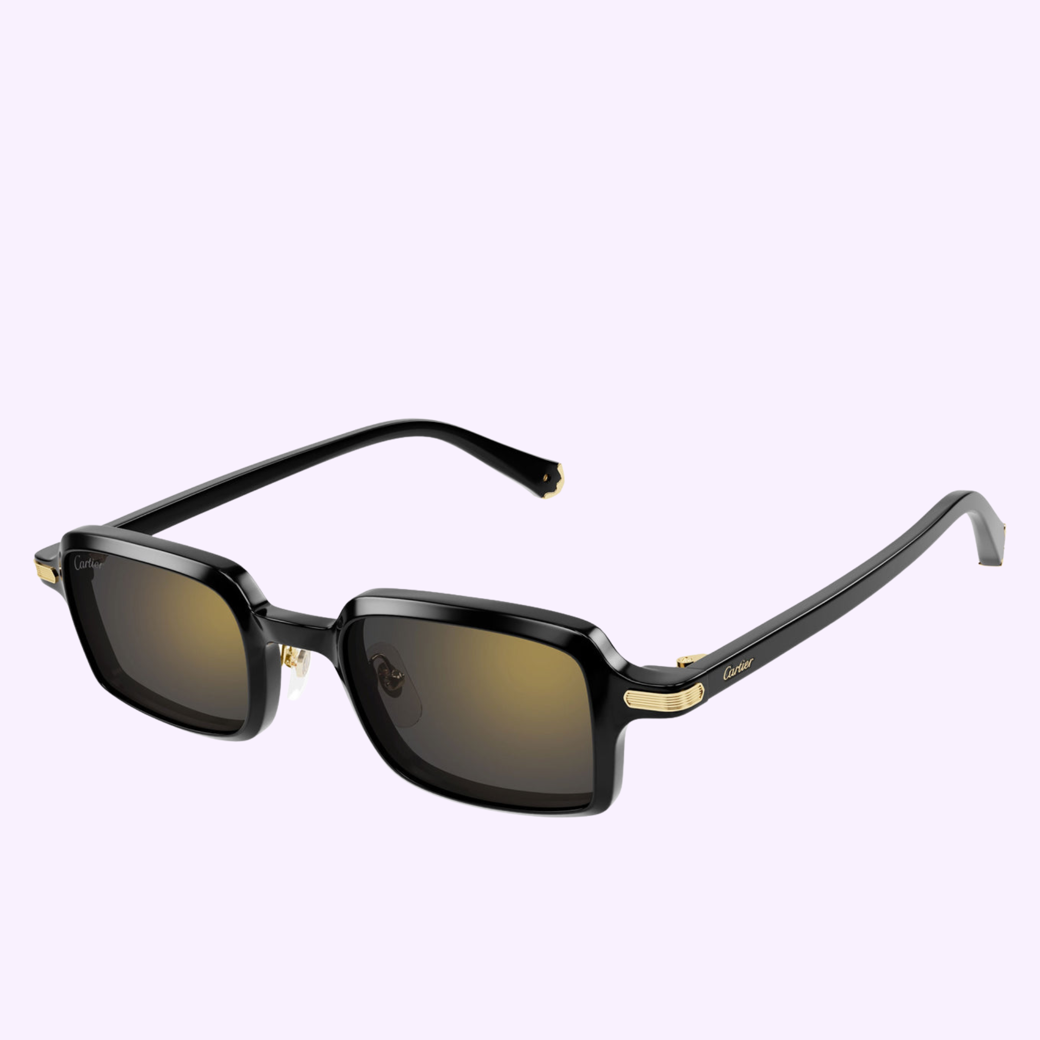 Cartier Sunglasses CT0539S-001 49 in black, featuring gold arm accents and brown-tinted lenses, are shown against a light purple background—a stylish luxury accessory by Cartier Sunglasses.