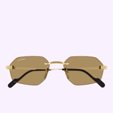 Front view of Cartier Sunglasses CT0616S-002 54 by Cartier Sunglasses, showcasing elegant gold rimless frames, brown geometric lenses, and signature Cartier branding on the upper corners, set against a pale lavender background. This is an exquisite piece of luxury eyewear.