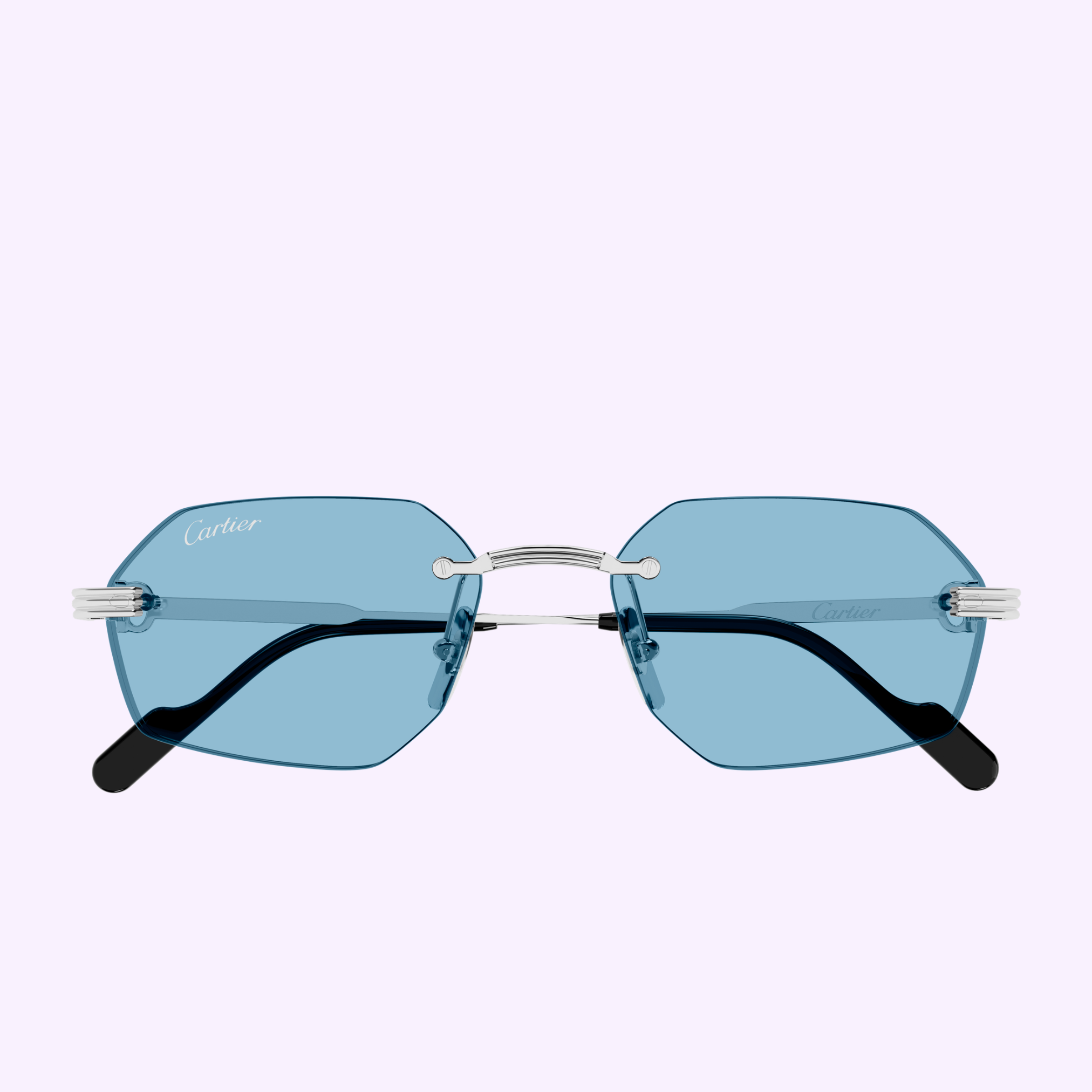 Front view of Cartier Sunglasses CT0616S-005 54, showcasing geometric blue-tinted rimless lenses with silver temples and black tips—luxury Cartier eyewear against a light pastel background.