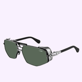 The Cazal Sunglasses MOD 050 Anniversary Edition 9568475821 by Cazal Sunglasses feature futuristic rectangular green lenses, a sleek silver metallic frame, and bold black arms. Inspired by the iconic craftsmanship of Cazal Legends, the sides showcase a distinctive gear-like mechanical design that highlights the brand’s signature ingenuity.