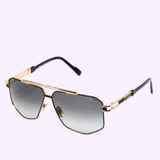 Cazal Sunglasses mod 9110 001 91100016211 by Cazal Sunglasses feature gold-toned aviator frames with black arms and gray gradient lenses, displayed against a light purple background—a luxury eyewear piece offering the timeless silhouette of classic aviators.