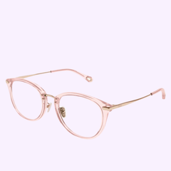The Chloe Optical CH0248OA-002 53 eyeglasses by Chloe Sunglasses feature pink round frames with clear rims, thin gold metal arms, and a braided metal core, displayed on a light purple background.