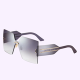 Dior Sunglasses DIORCLUB M5U CD40117U 0010C for women feature oversized square frames, gradient grey lenses, gold accents, and wide translucent purple arms with a Christian Dior logo against a pastel Miami-inspired background.