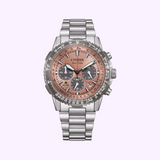 Citizen Watches CA4664-60X Promaster Eco-Drive (UPC: 013205169588) in stainless steel with a rose gold dial, black subdials, silver hour markers, and metal link bracelet, shown on a light lavender background.