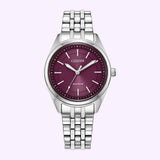 Citizen Watches Peyten EM1230-54X analog wristwatch featuring a stainless steel link band and a deep purple face with silver hands and hour markers.