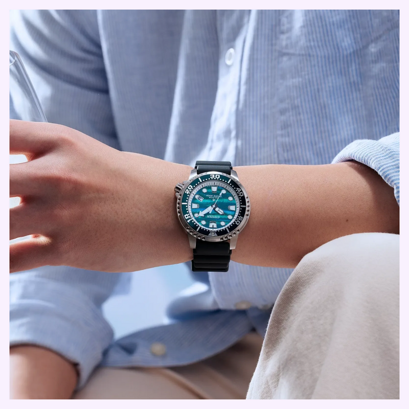 Man wearing the Citizen Promaster Dive BN0167-09W limited edition dive watch with teal structural ink dial