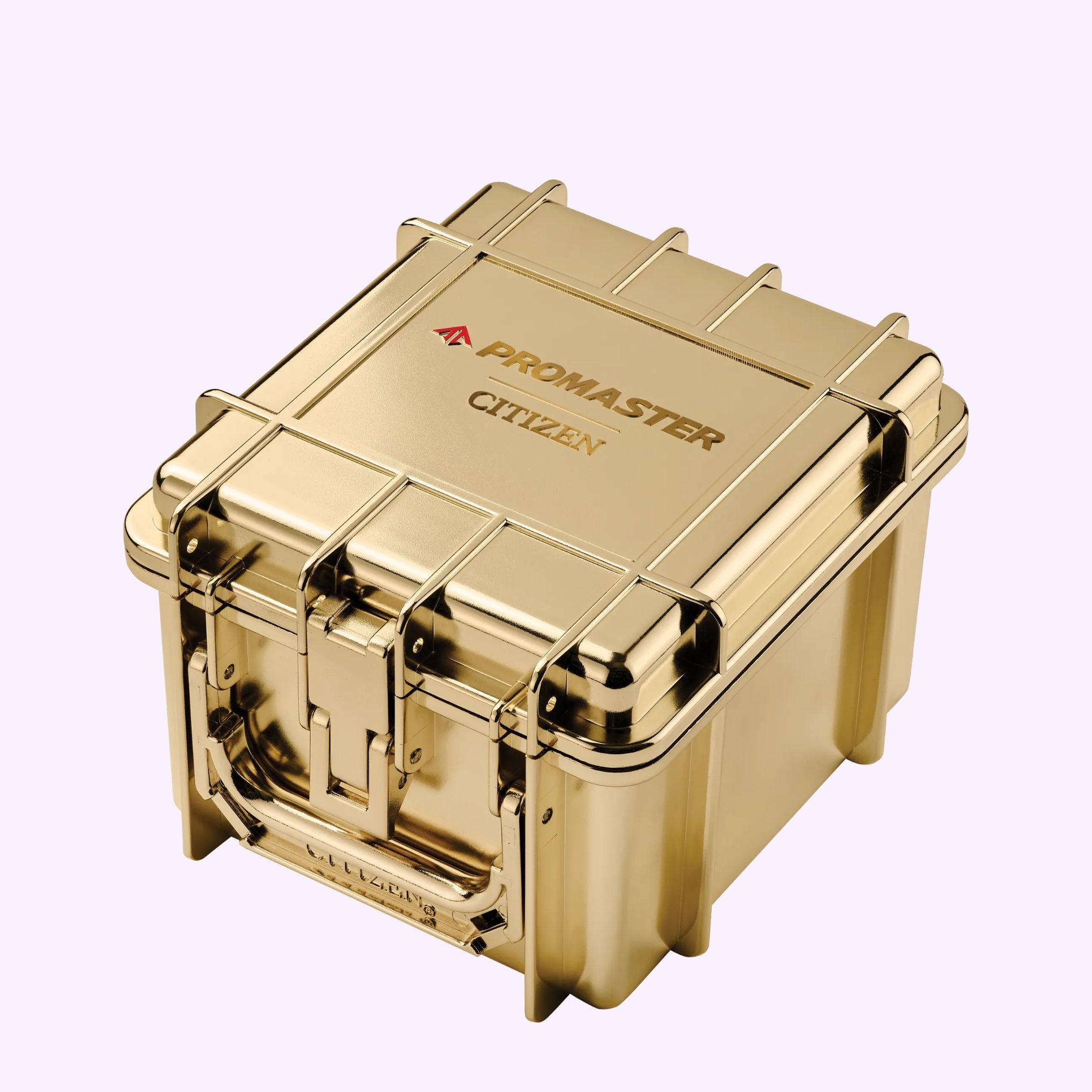 Gold-toned, rectangular protective hard case for a Citizen Watches Promaster Skyhawk A-T JY8144-50E, with the text PROMASTER CITIZEN embossed on the lid.