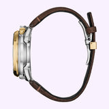 Side view of a Citizen Watches Promaster Tsuno Chrono Racer AV0104-06W with a silver and gold-tone case and a brown leather strap.