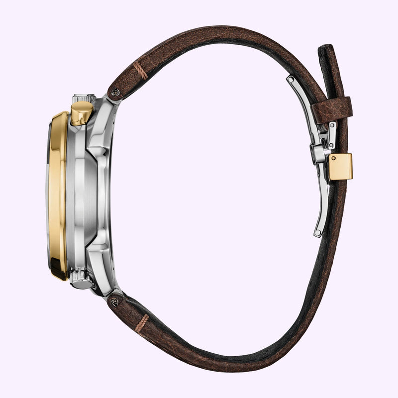 Side view of the Citizen Tsuno Chrono Racer AV0104-06W showing the silver and gold-tone case and brown leather strap