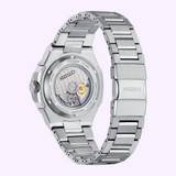 Back view of the Citizen Watches Series8 880 GMT NB6031-56E reveals a transparent case back with visible movement and engraved branding. The stainless steel band is partially unfastened, showcasing its links.