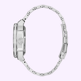 Side view of a Citizen Watches Series8 880 GMT NB6031-56E, a silver stainless steel watch with metal link band and round case, on a pale lavender background. Unclasped bracelet and crown details are visible.