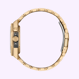 Side view of a Citizen Watches Series8 890 NB6069-53H with a round face and rose gold-tone stainless steel linked band against a light purple background, showing buttons and side details.